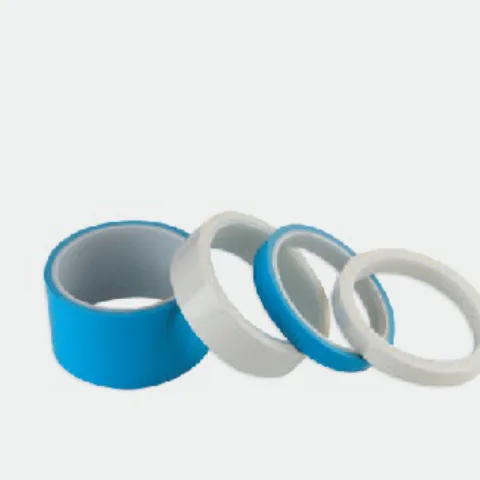 Rolls of blue and white thermal conductive tape