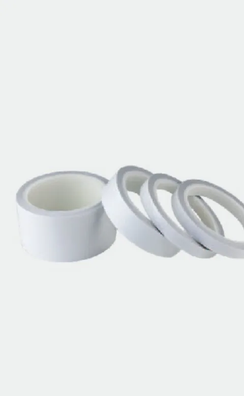 Rolls of white tissue double-sided tape
